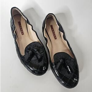 Prada Black Patent Quilted Tassel Flats